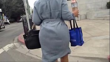 booty walking in a dress